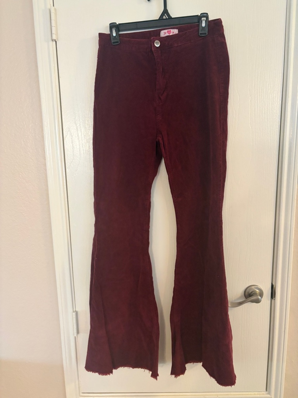 Buddy Love - maroon corduroy flare bellbottoms raw hem.  Sz 31